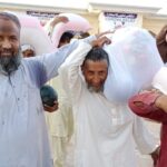 Distribution of rations to the poor, polygamous, families